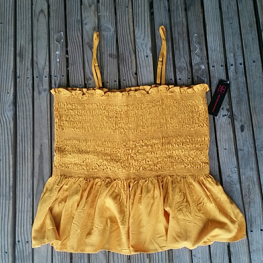 Cute peplum top in yellowish gold